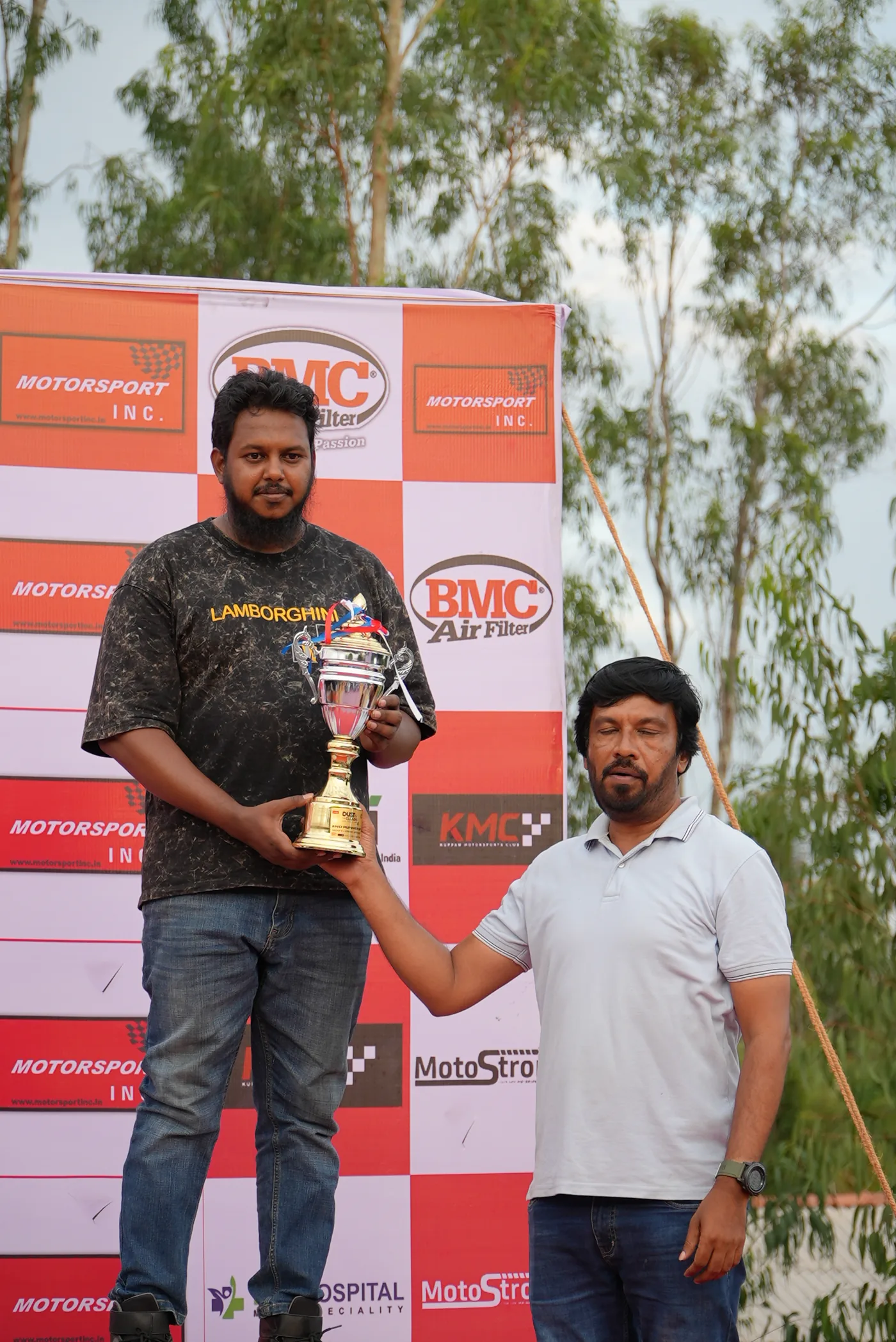 Runner-up receiving the class trophy at Dust to the Clouds 4