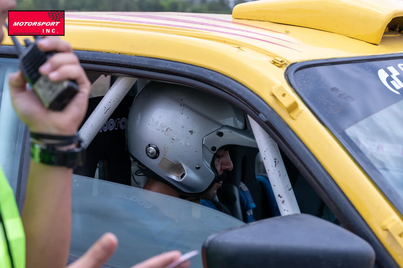 Driver strapped in and ready at the start line