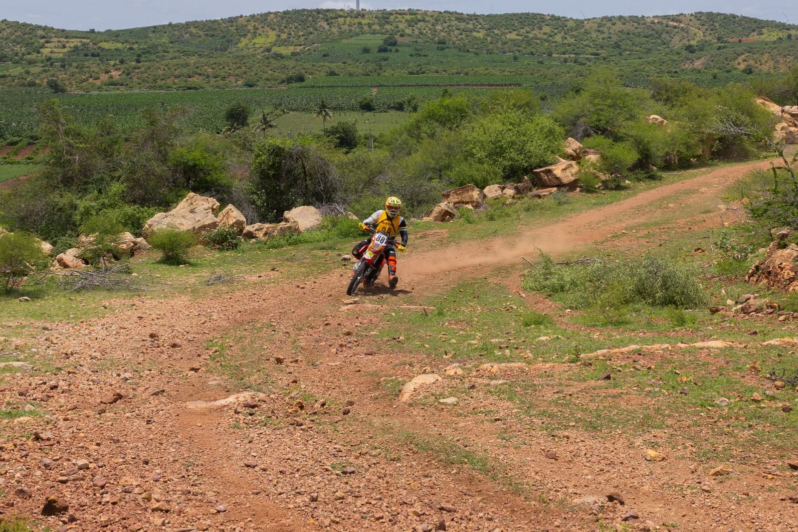 Rider on a gravel trail during a Motorsport Inc rally